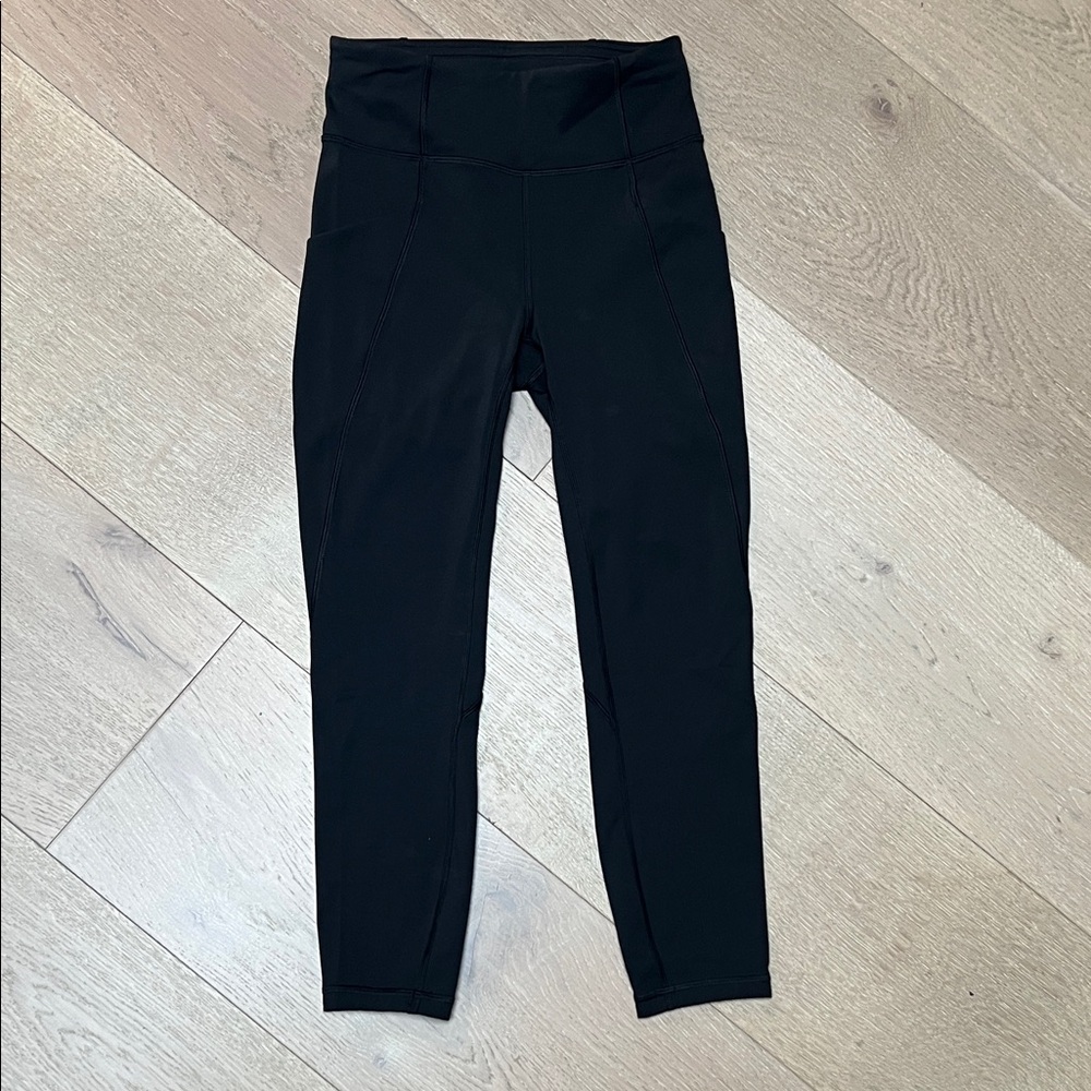 Lululemon Size 4, Black High-Waisted Leggings with side pockets